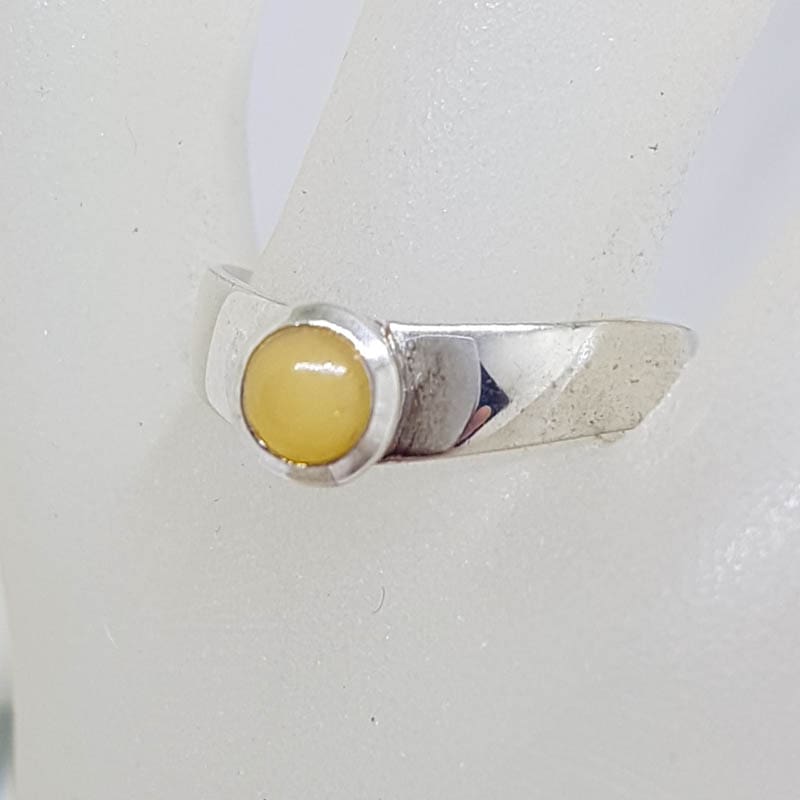 Sterling Silver Round Butter Amber in Curve Ring