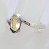 Sterling Silver Oval Citrine in Curved Ring
