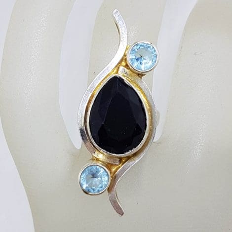 Sterling Silver Elongated Teardrop / Pear Shape Onyx with 2 Round Topaz Curved Ring