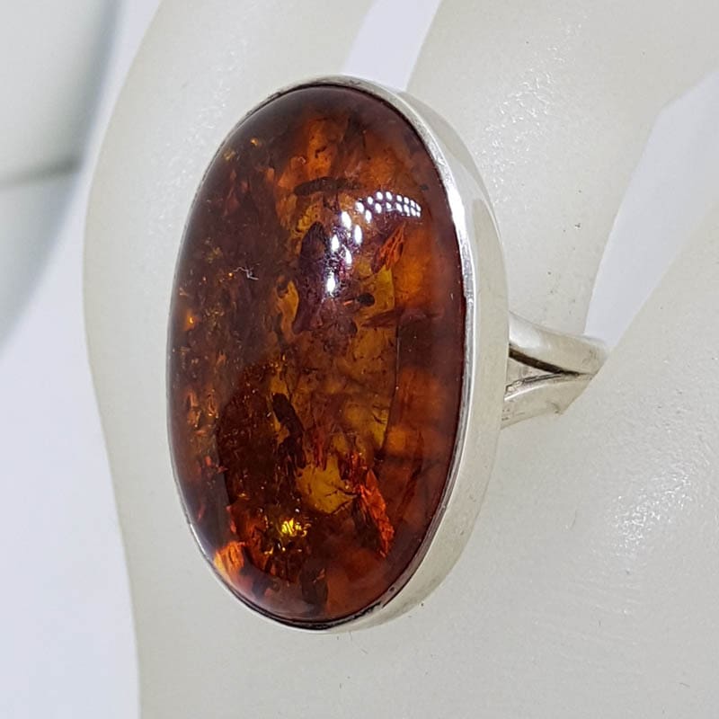 Sterling Silver Large Oval Bezel Set Amber Ring