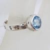 Sterling Silver Round Topaz in Bezel Setting with Patterned Band Ring