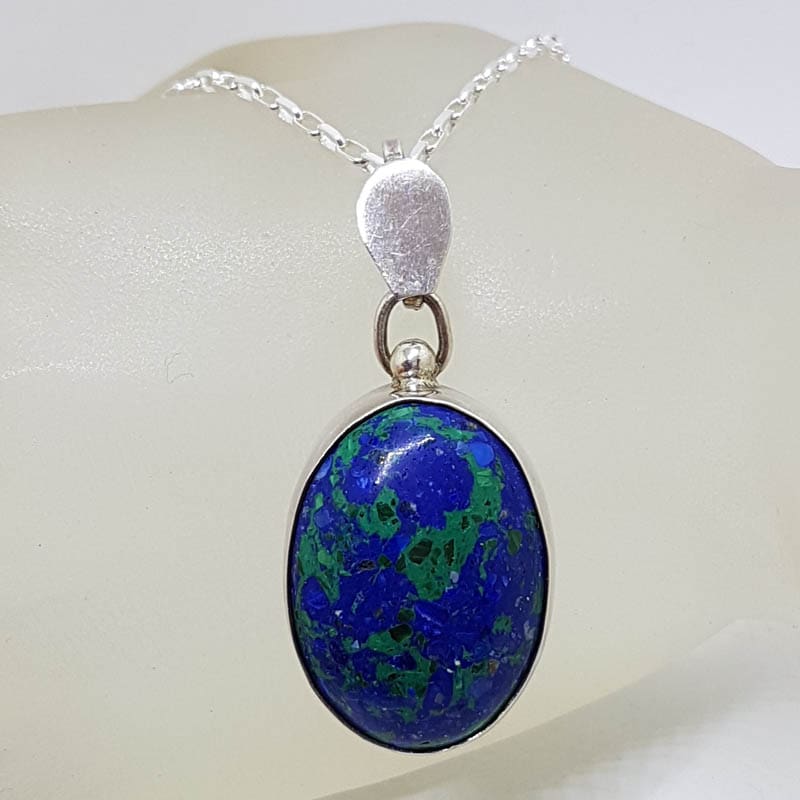 Sterling Silver Azurite Malachite Oval Bezel Set Pendant on Silver Chain Sterling Silver Azurite Malachite Oval Bezel Set Pendant on Silver Chain