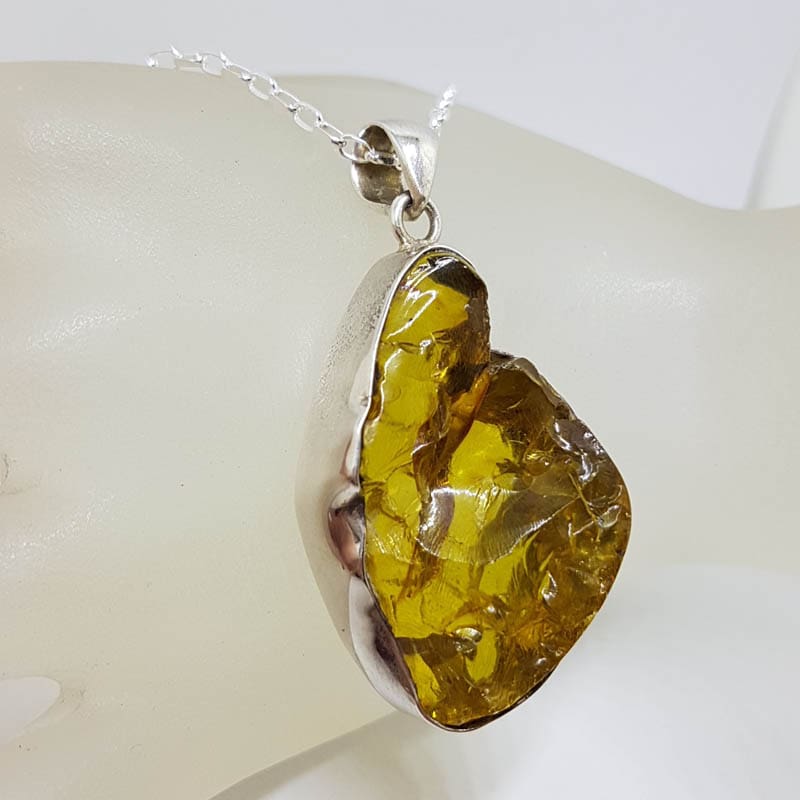 Sterling Silver Amber Large Unusual Freeform Shape Pendant on Silver Chain Sterling Silver Amber Large Unusual Freeform Shape Pendant on Silver Chain