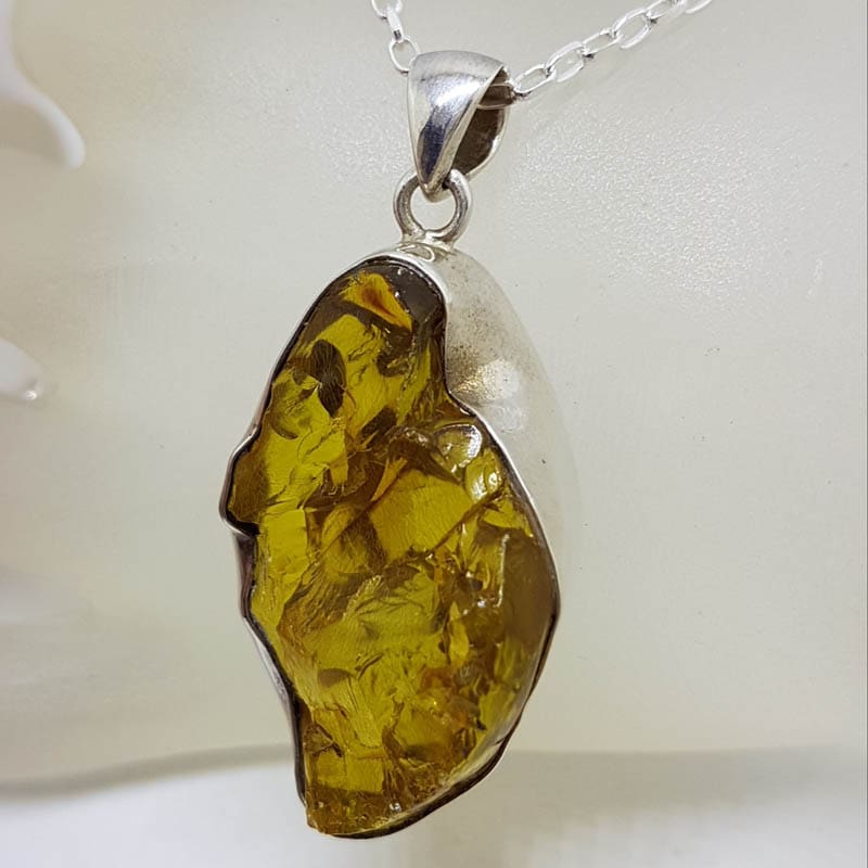 Sterling Silver Amber Large Unusual Freeform Shape Pendant on Silver Chain Sterling Silver Amber Large Unusual Freeform Shape Pendant on Silver Chain