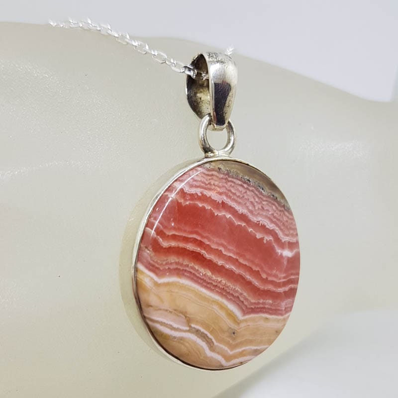 Sterling Silver Rhodochrosite Large Round Bezel Set Pendant on Silver Chain Sterling Silver Rhodochrosite Large Round Bezel Set Pendant on Silver Chain