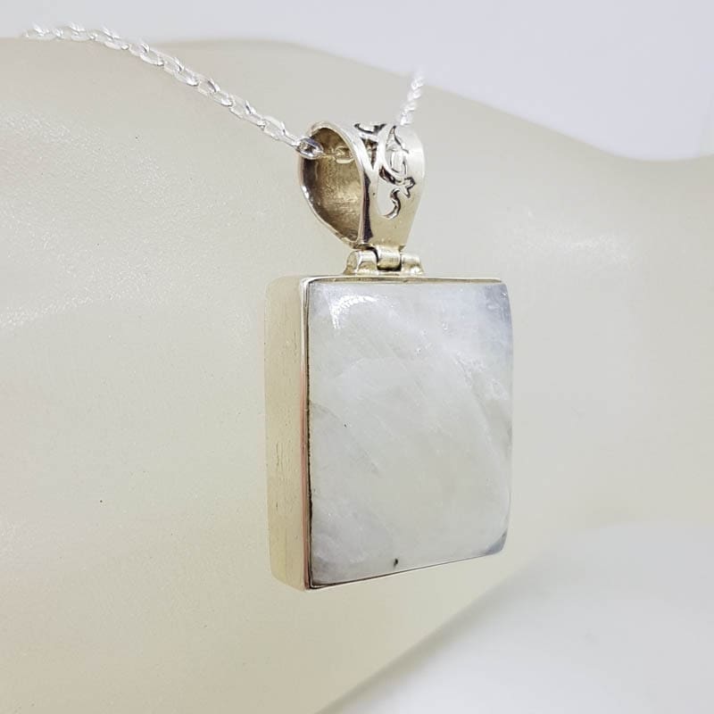 Sterling Silver Moonstone Rectangular Ornate Top Pendant on Silver Chain Sterling Silver Moonstone Rectangular Ornate Top Pendant on Silver Chain