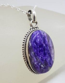 Sterling Silver Charoite Oval with Ornate Twist Rim Pendant on Silver Chain