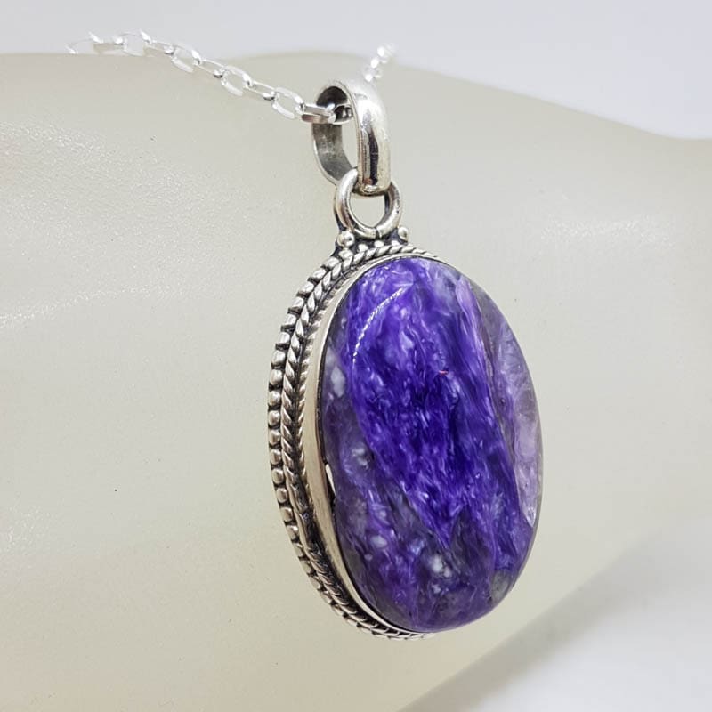 Sterling Silver Charoite Oval with Ornate Twist Rim Pendant on Silver Chain