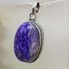 Sterling Silver Charoite Oval with Ornate Twist Rim Pendant on Silver Chain
