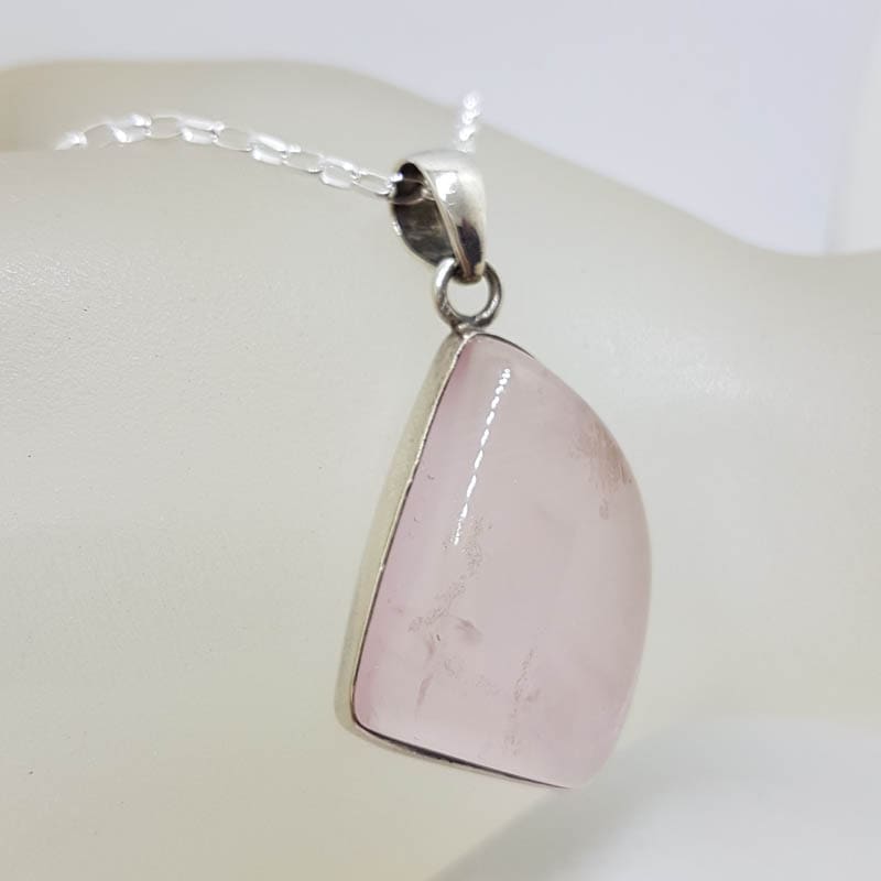 Sterling Silver Rose Quartz Unusual Shape Bezel Set Pendant on Silver Chain Sterling Silver Rose Quartz Unusual Shape Bezel Set Pendant on Silver Chain