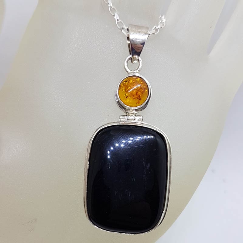 Sterling Silver Onyx Large Rectangular Stone with Round Amber Pendant on Silver Chain Sterling Silver Onyx Large Rectangular Stone with Round Amber Pendant on Silver Chain