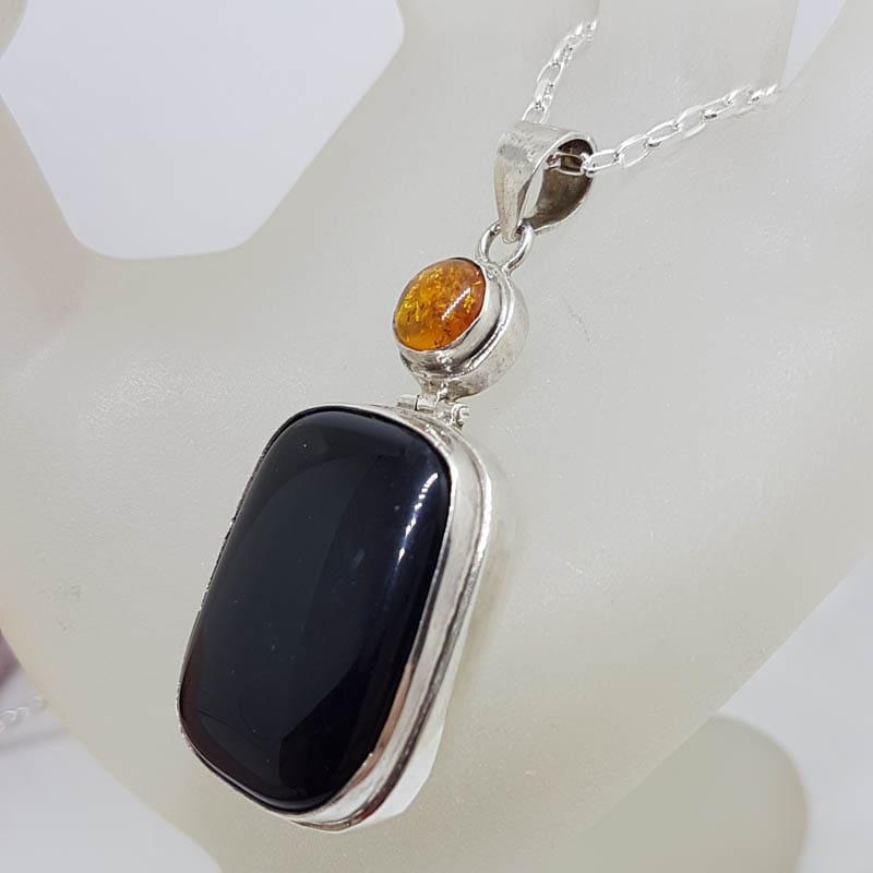 Sterling Silver Onyx Large Rectangular Stone with Round Amber Pendant on Silver Chain Sterling Silver Onyx Large Rectangular Stone with Round Amber Pendant on Silver Chain