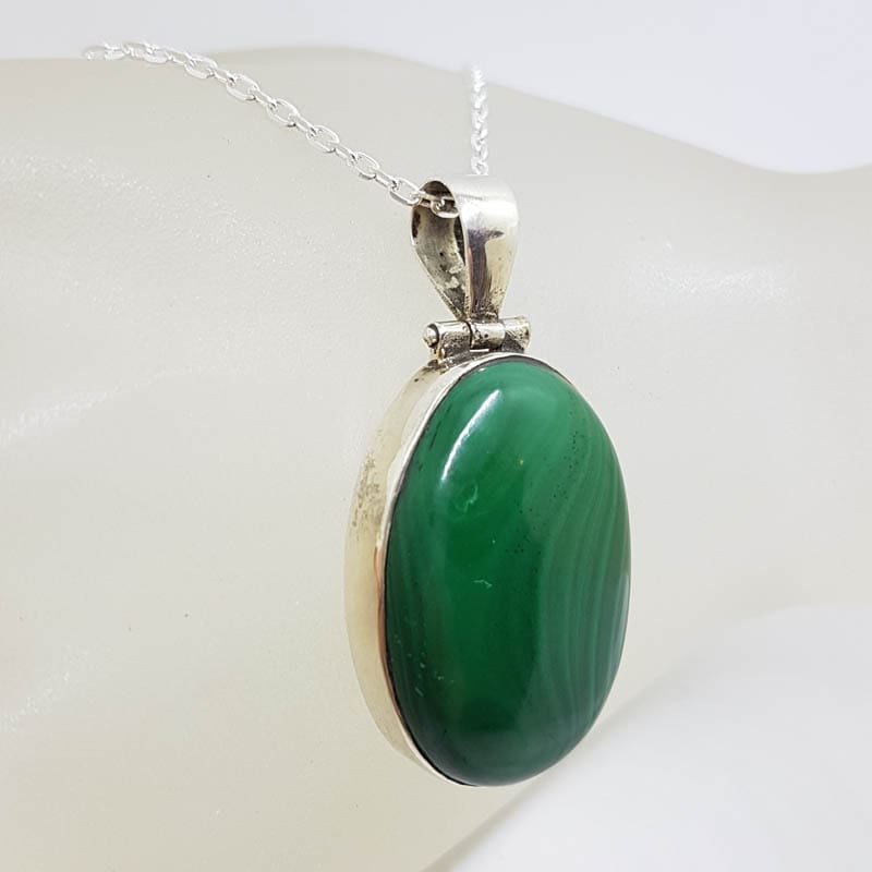 Sterling Silver Malachite Large Oval Bezel Set Pendant on Silver Chain Sterling Silver Malachite Large Oval Bezel Set Pendant on Silver Chain