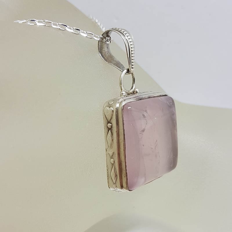 Sterling Silver Rose Quartz Square with Ornate Rim Pendant on Silver Chain Sterling Silver Rose Quartz Square with Ornate Rim Pendant on Silver Chain