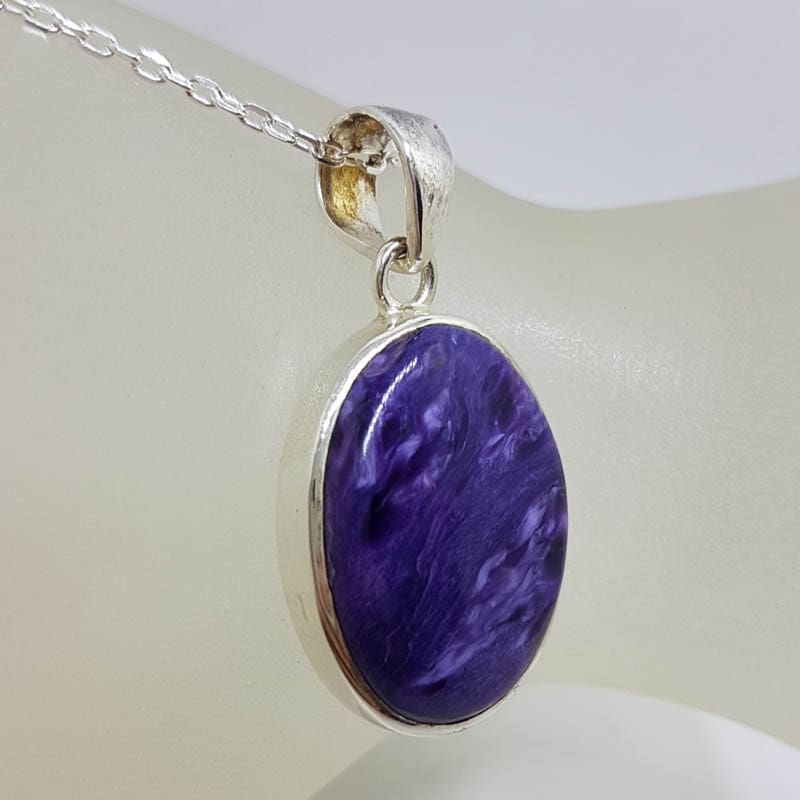 Sterling Silver Charoite Oval Bezel Set Pendant on Silver Chain Sterling Silver Charoite Oval Bezel Set Pendant on Silver Chain