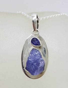 Sterling Silver Tanzanite Natural Cut Freeform Shape and Faceted on Oval Disc Pendant on Silver Chain