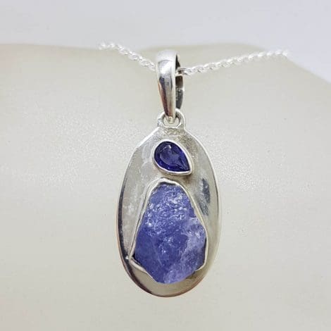 Sterling Silver Tanzanite Natural Cut Freeform Shape and Faceted on Oval Disc Pendant on Silver Chain