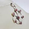 Sterling Silver Ruby Round Swirl Pendant on Silver Chain