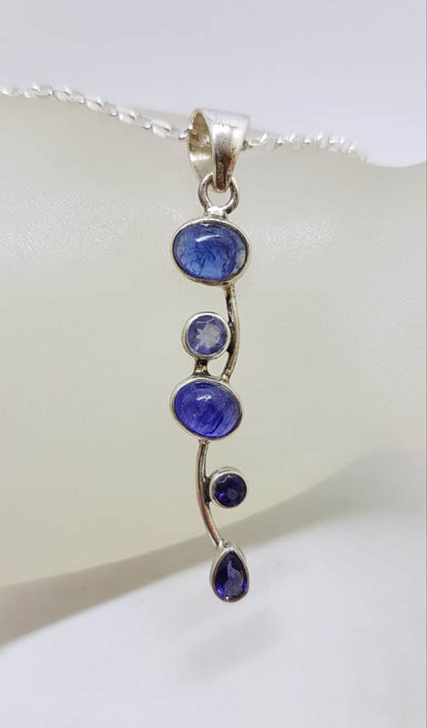 Sterling Silver Tanzanite Cabochon Cut and Faceted Long Twisted Pendant on Silver Chain