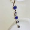 Sterling Silver Tanzanite Cabochon Cut and Faceted Long Twisted Pendant on Silver Chain