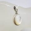 Sterling Silver Mother of Pearl Oval Bezel Set Pendant on Silver Chain
