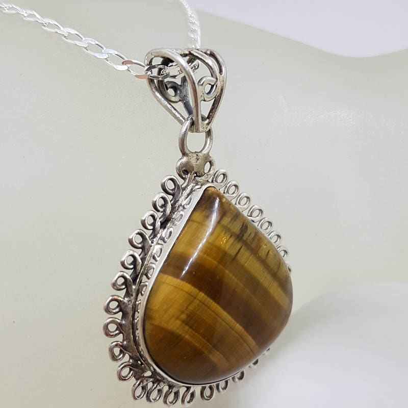 Sterling Silver Tiger Eye Cabochon Cut Teardrop / Pear Shape Twist Rim Pendant on Silver Chain