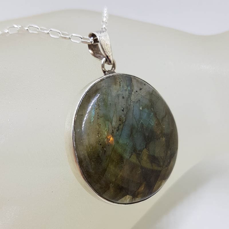 Sterling Silver Labradorite Cabochon Cut Round Pendant on Silver Chain Sterling Silver Labradorite Cabochon Cut Round Pendant on Silver Chain