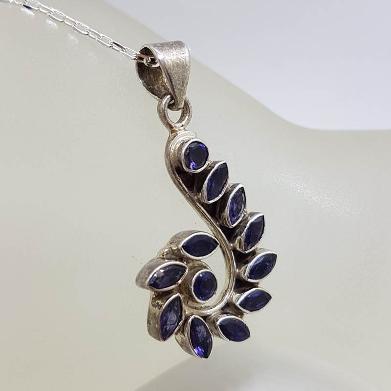 Sterling Silver Iolite Cluster Long Swirl Design Pendant on Silver Chain Sterling Silver Iolite Cluster Long Swirl Design Pendant on Silver Chain