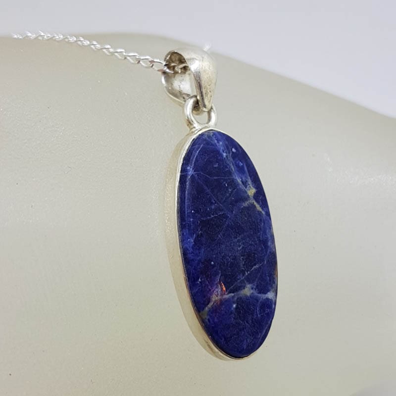 Sterling Silver Sodalite Oval Bezel Set Pendant on Silver Chain Sterling Silver Sodalite Oval Bezel Set Pendant on Silver Chain