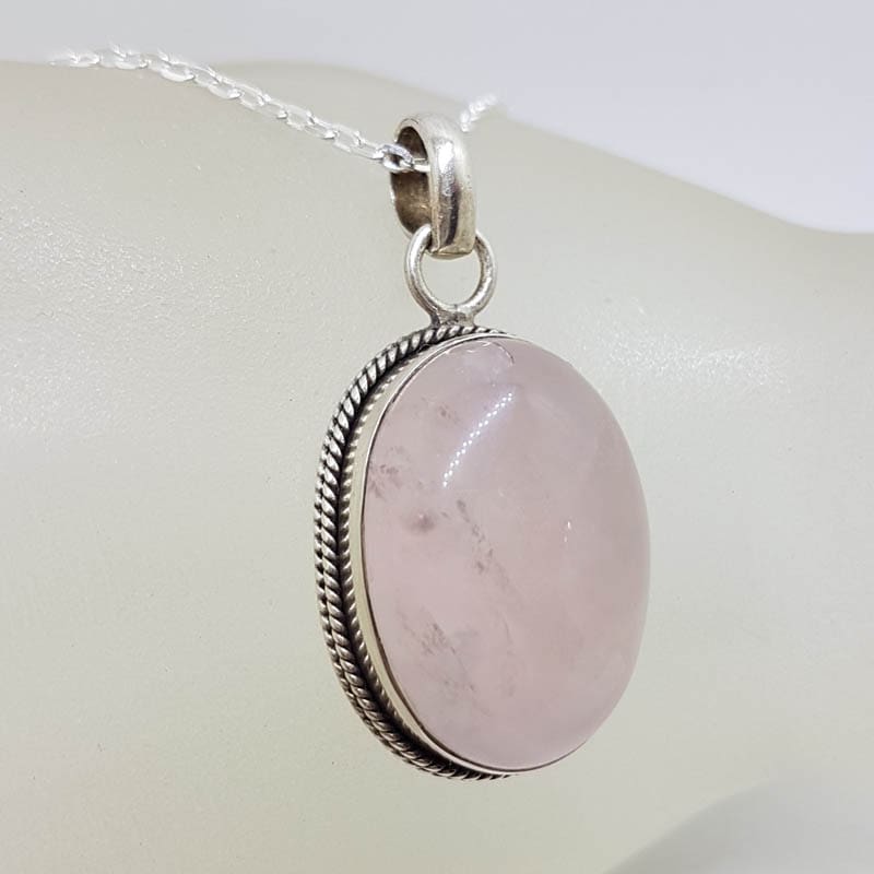 Sterling Silver Rose Quartz Cabochon Cut Bezel Set Oval Pendant on Silver Chain Sterling Silver Rose Quartz Cabochon Cut Bezel Set Oval Pendant on Silver Chain