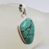 Sterling Silver Natural Turquoise Freeform Shape Pendant on Silver Chain