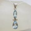 Sterling Silver Long Ornate Design Two Stone Topaz Pendant on Silver Chain