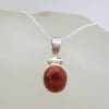 Sterling Silver Oval Bezel Set Coral Pendant on Silver Chain