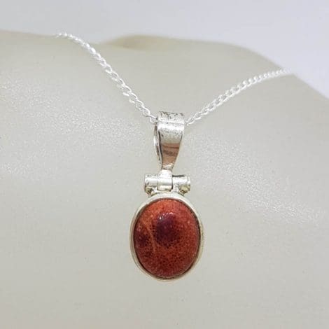 Sterling Silver Oval Bezel Set Coral Pendant on Silver Chain