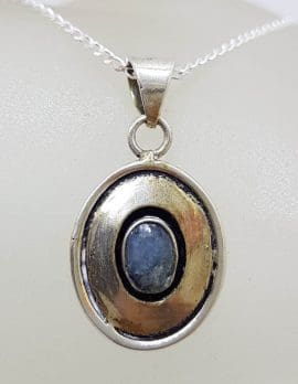 Sterling Silver Oval Rimmed Sapphire Pendant on Silver Chain