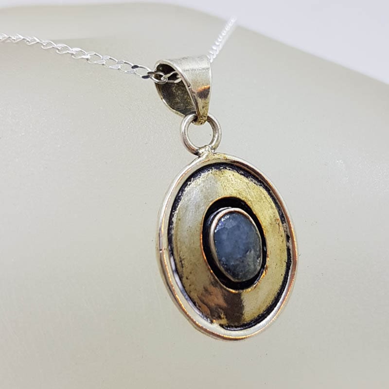 Sterling Silver Oval Rimmed Sapphire Pendant on Silver Chain