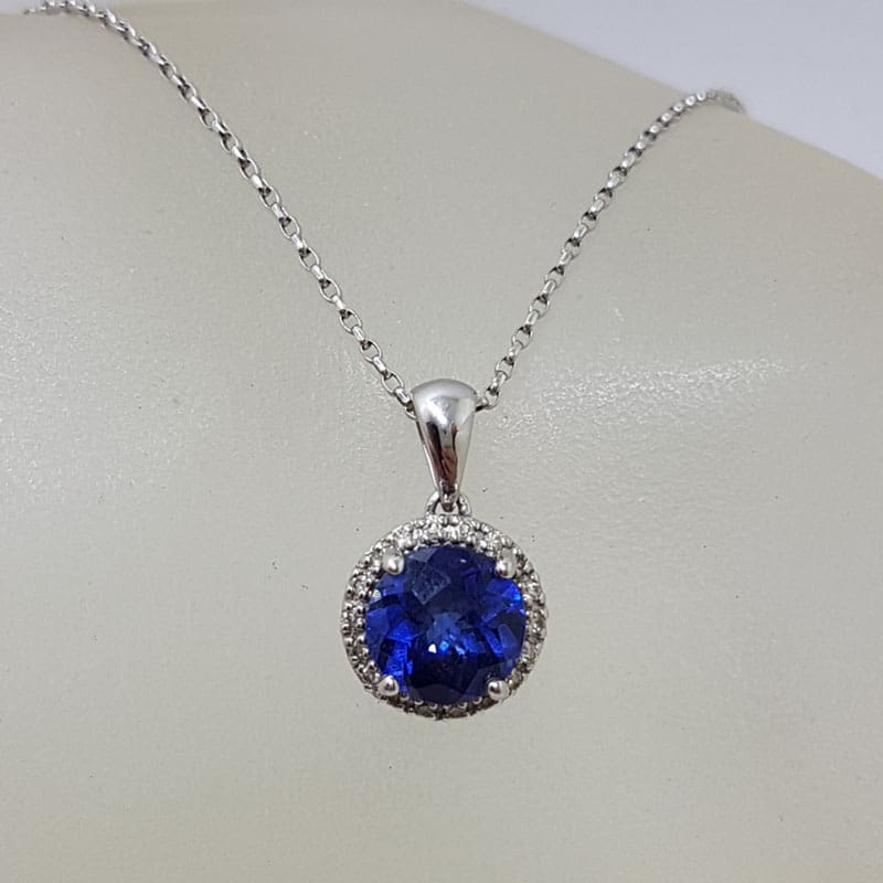 * SOLD * 9ct White Gold Round Created Blue Sapphire surrounded by ...