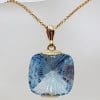 9ct Yellow Gold Large Square Laser Cut Blue Topaz Pendant on 9ct Chain