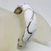 Sterling Silver Heavy Ostrich Leather White Oval Hinged Bangle with Wave Motif - Unique