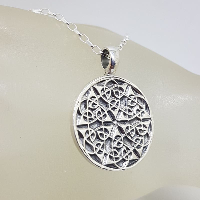 Sterling Silver Celtic Knots Round Disc Pendant on Silver Chain Sterling Silver Celtic Knots Round Disc Pendant on Silver Chain