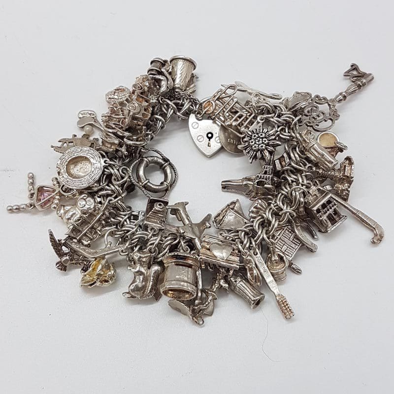 Sterling Silver Very Heavy Multi-Charm Bracelet Includes Many Fascinating Charms - Antique / Vintage