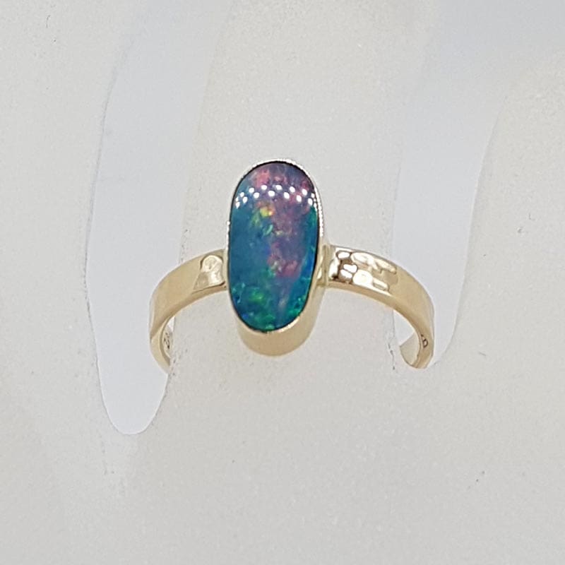 9ct Yellow Gold Opal Elongated Oval Bezel Set Ring 9ct Yellow Gold Opal Elongated Oval Bezel Set Ring