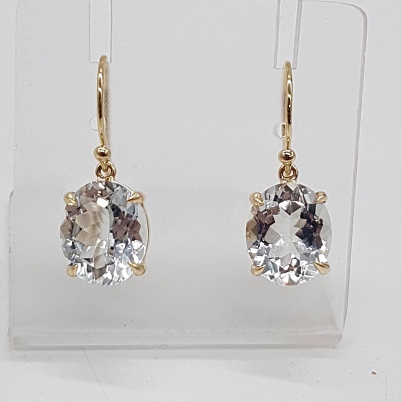 9ct Yellow Gold White Topaz Oval Claw Set Drop Earrings