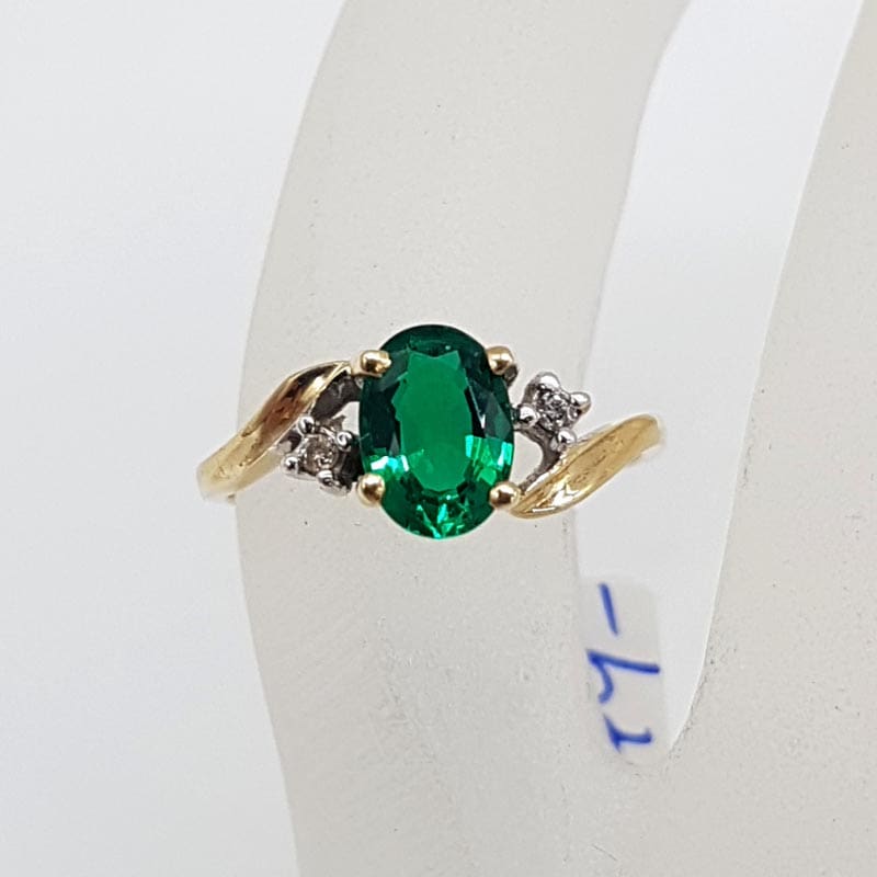9ct Yellow Gold Oval Created Emerald with two Diamonds Ring