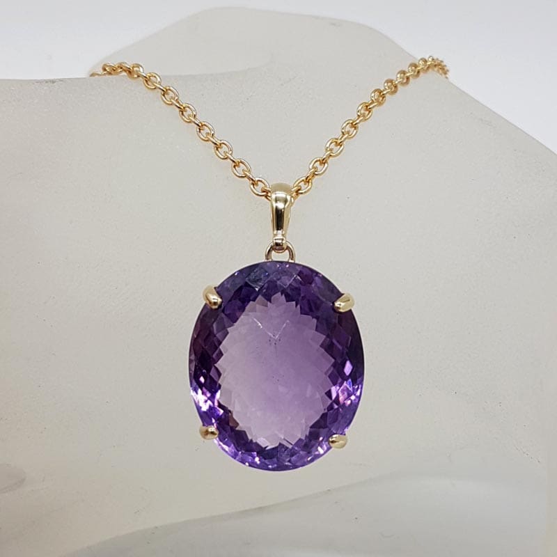9ct Yellow Gold Large Oval Claw Set Amethyst Pendant on Gold Chain