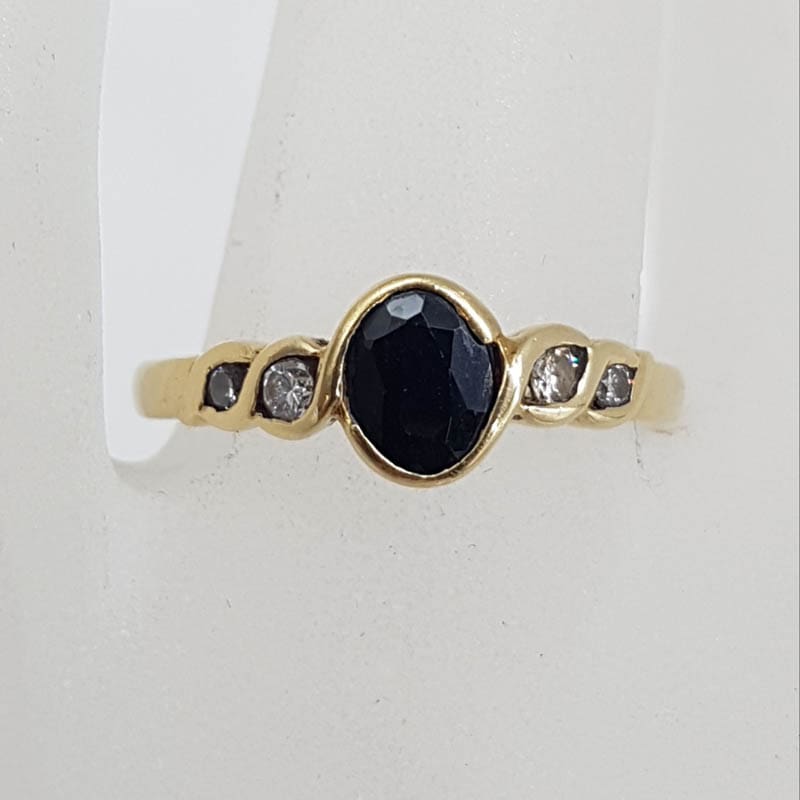 18ct Yellow Gold Oval Bezel Set Sapphire and Diamond Ring
