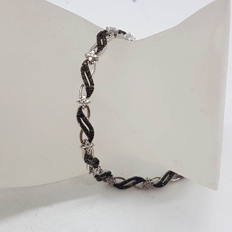 Sterling Silver Black and Clear Diamond Inifity Twist Bracelet
