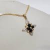 9ct Yellow Gold Onyx and Diamond Star / Cross Cluster Shaped Pendant on 9ct Yellow Gold Chain
