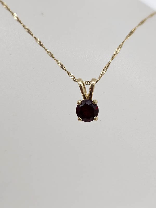 9ct Yellow Gold Garnet Round Claw Set Pendant on Gold Chain