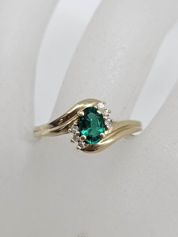 9ct Yellow Gold Created Emerald with Diamond Oval Curved Rings